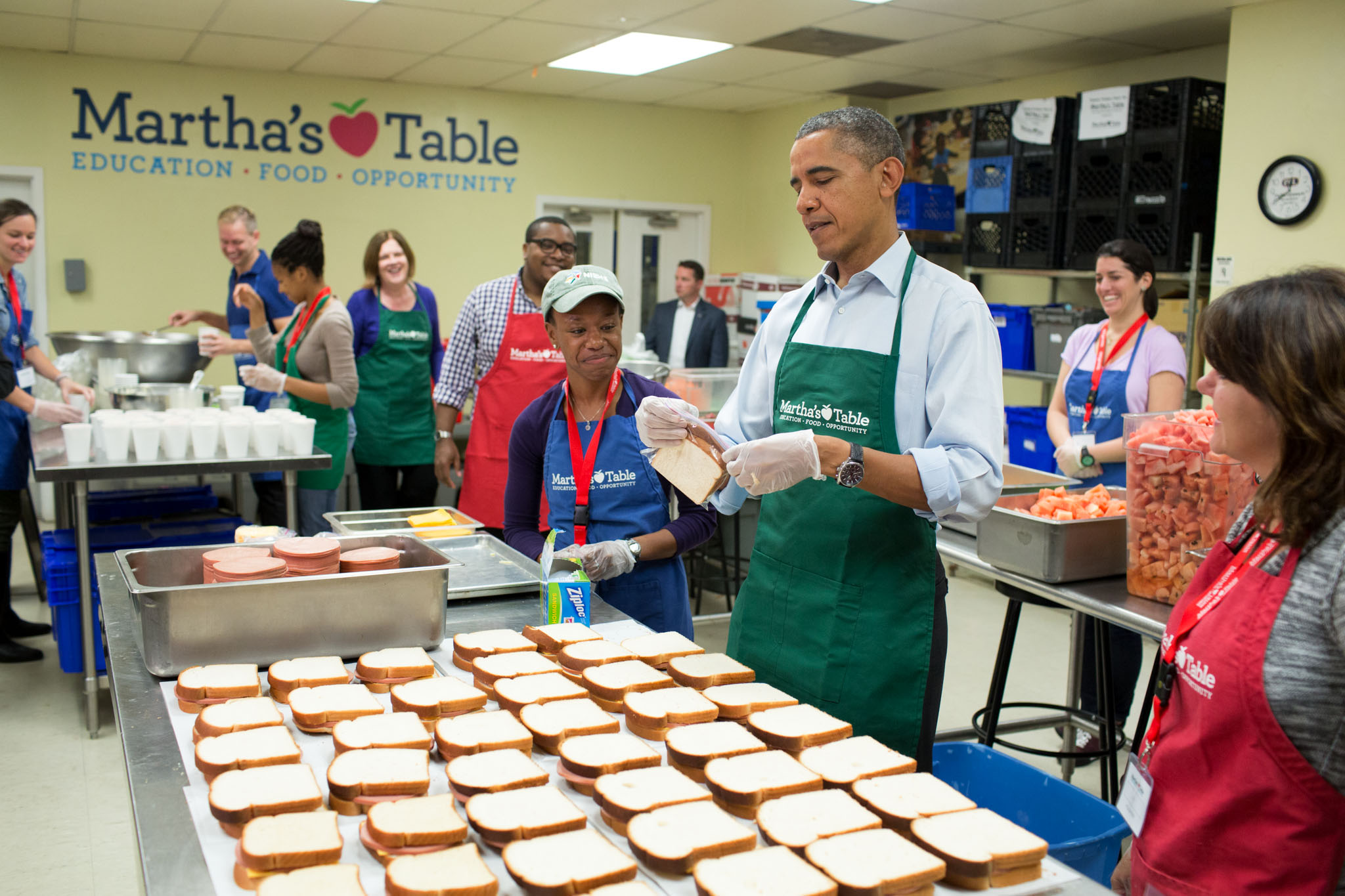 President Obama making sandwiches at Martha's Table