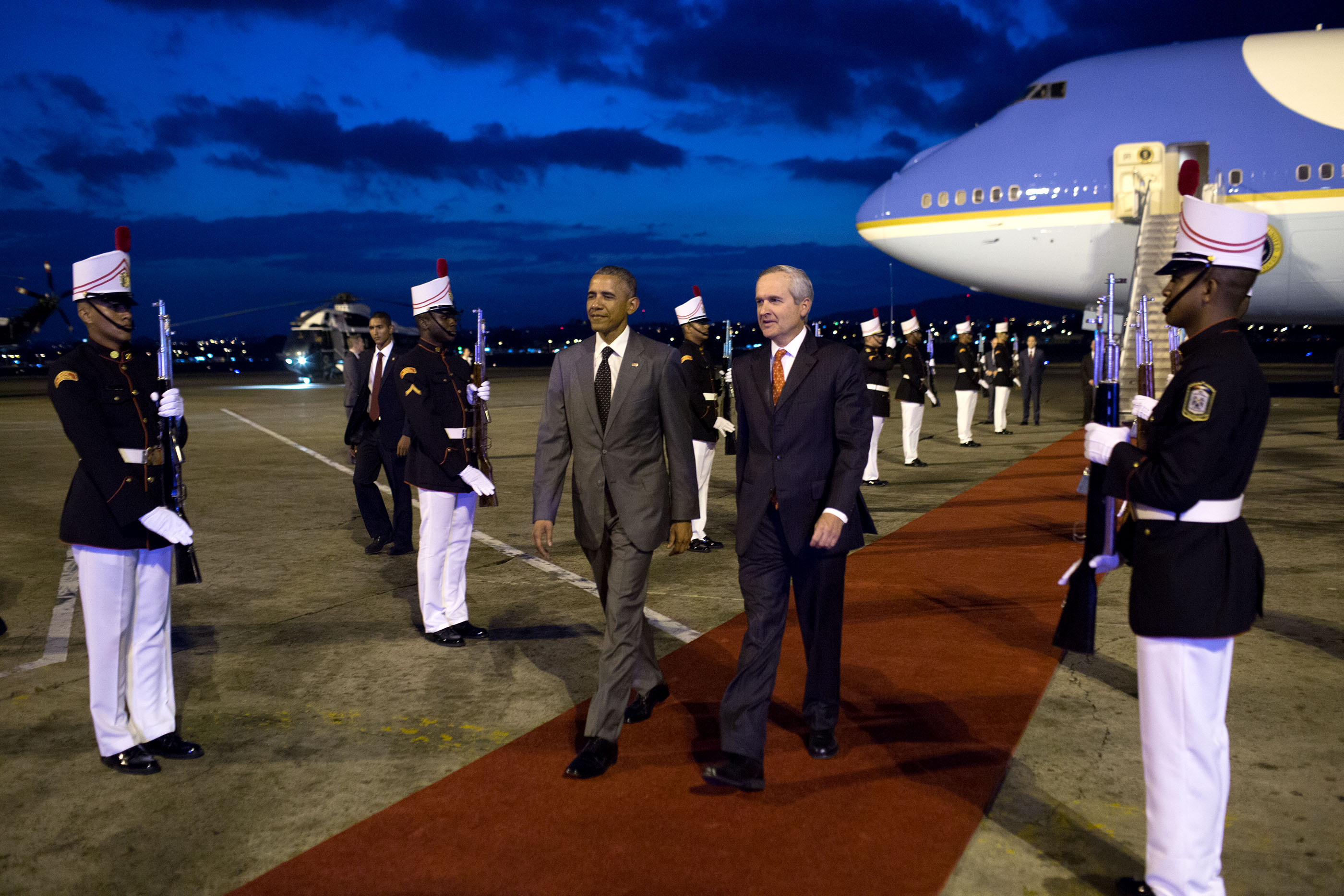 Alvaro Alemán, Minister of the Presidency, escorts the President through an honor guard at Tocumen International Airport in Panama City, Panama. (Official White House Photo by Pete Souza)