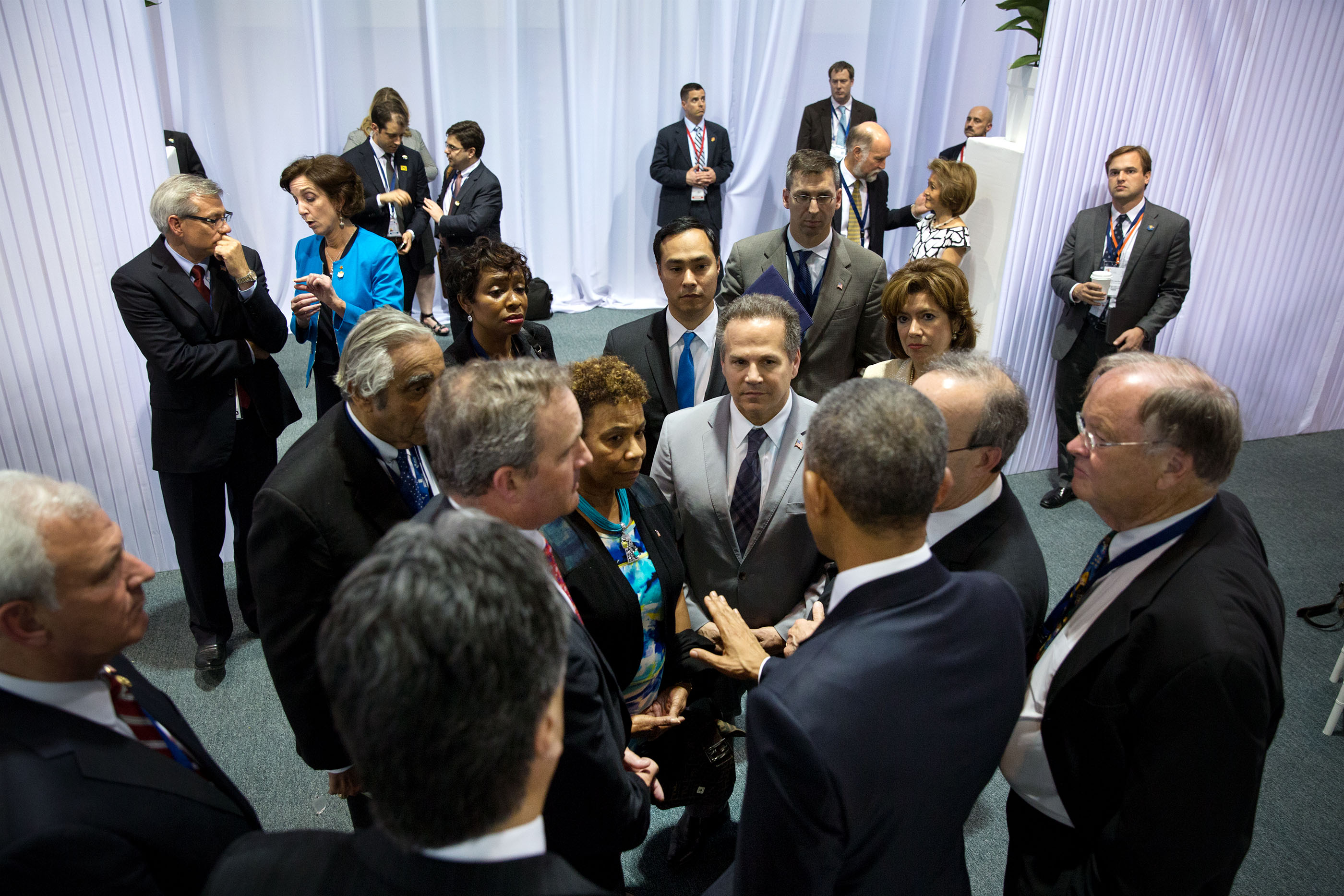 President Obama talks with the Congressional delegation that attended the Summit of the Americas. (Official White House Photo by Pete Souza)