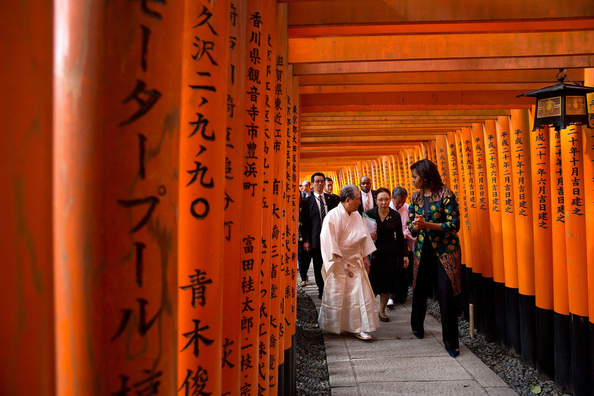 The First Lady is guided through the torri gates of the shrine. (Official White House Photo by Amanda Lucidon)