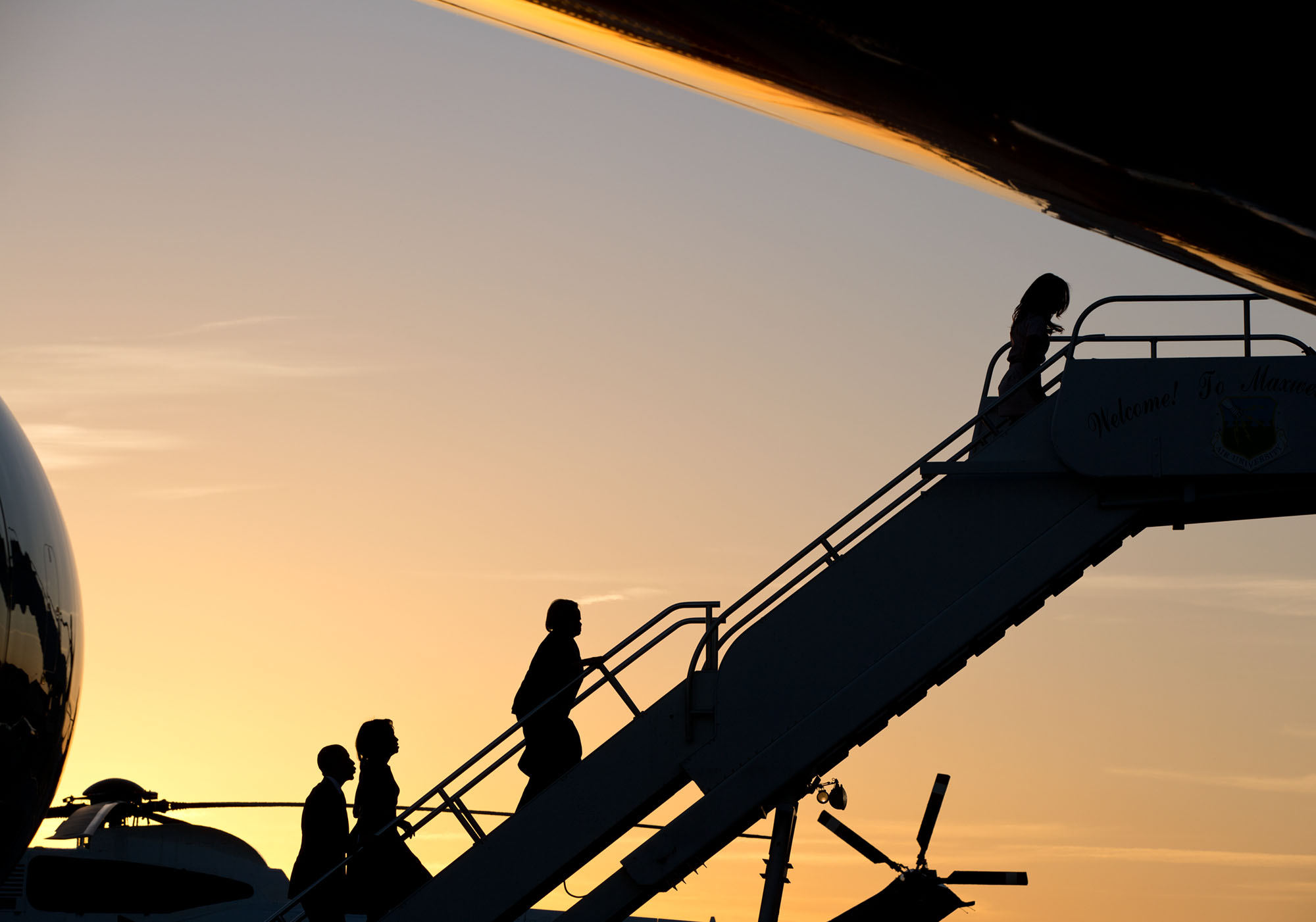 The President, First Lady, Marian Robinson and Malia board Air Force One at Maxwell Air Force Base en route back to Washington, D.C. (Official White House Photo by Pete Souza)