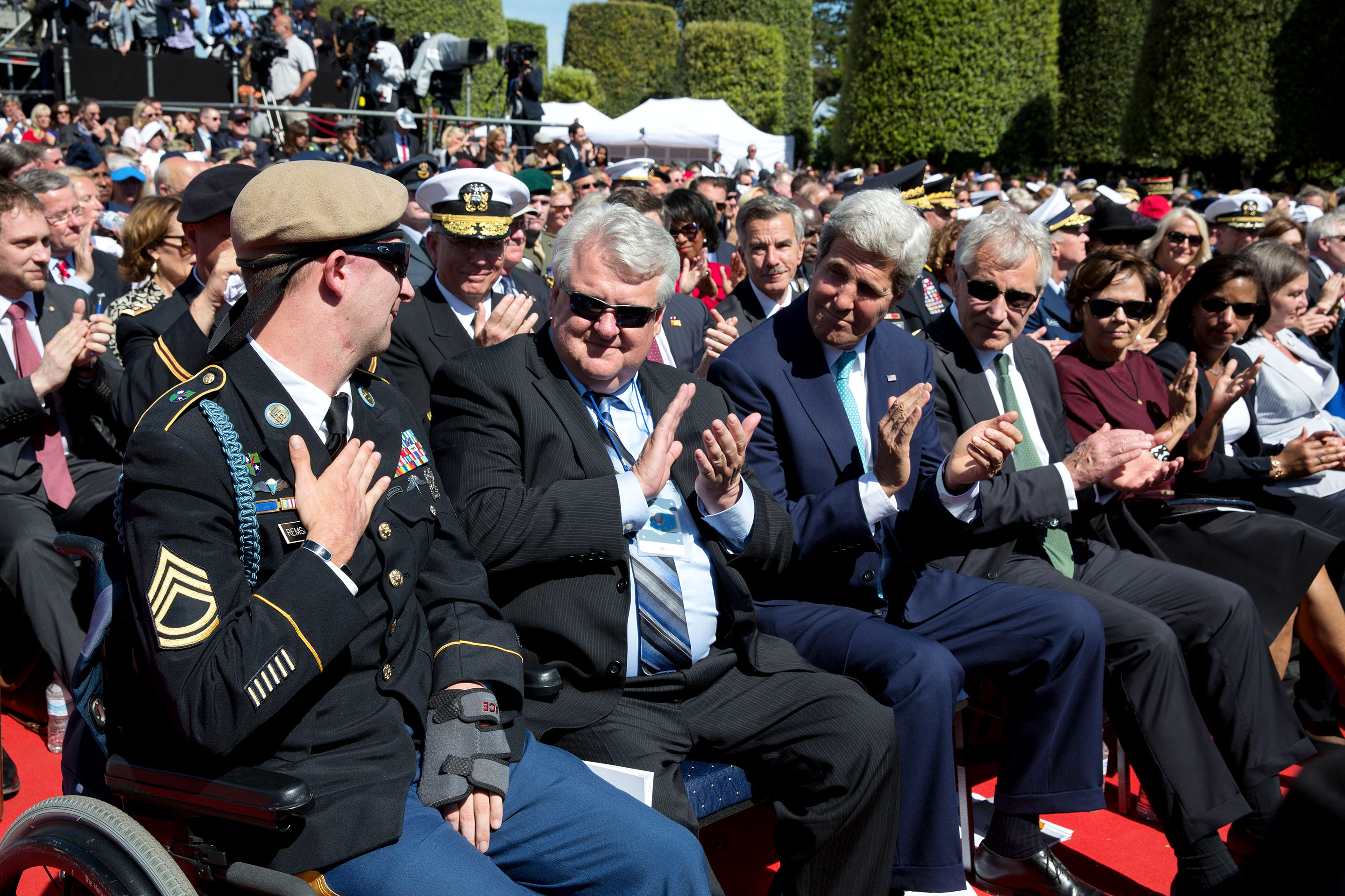 June 6, 2014: Cory reacts while being applauded by his father Craig, Secretary of State John Kerry, and Defense Secretary Chuck Hagel, as the President again paid tribute to Cory. (Official White House Photo by Pete Souza)