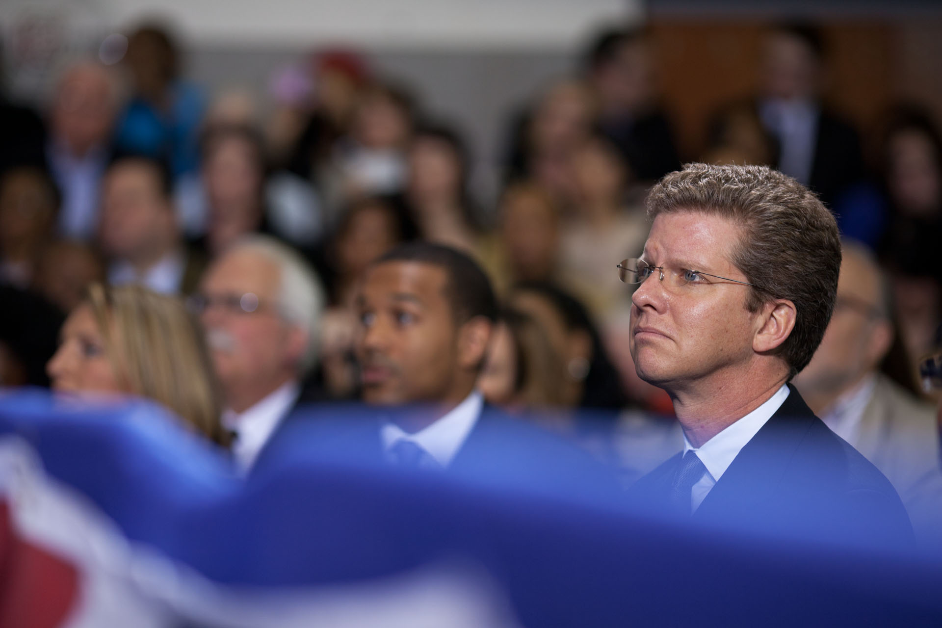 HUD Secretary Shaun Donovan listens as President Obama delivers remarks on housing (February 1, 2012)