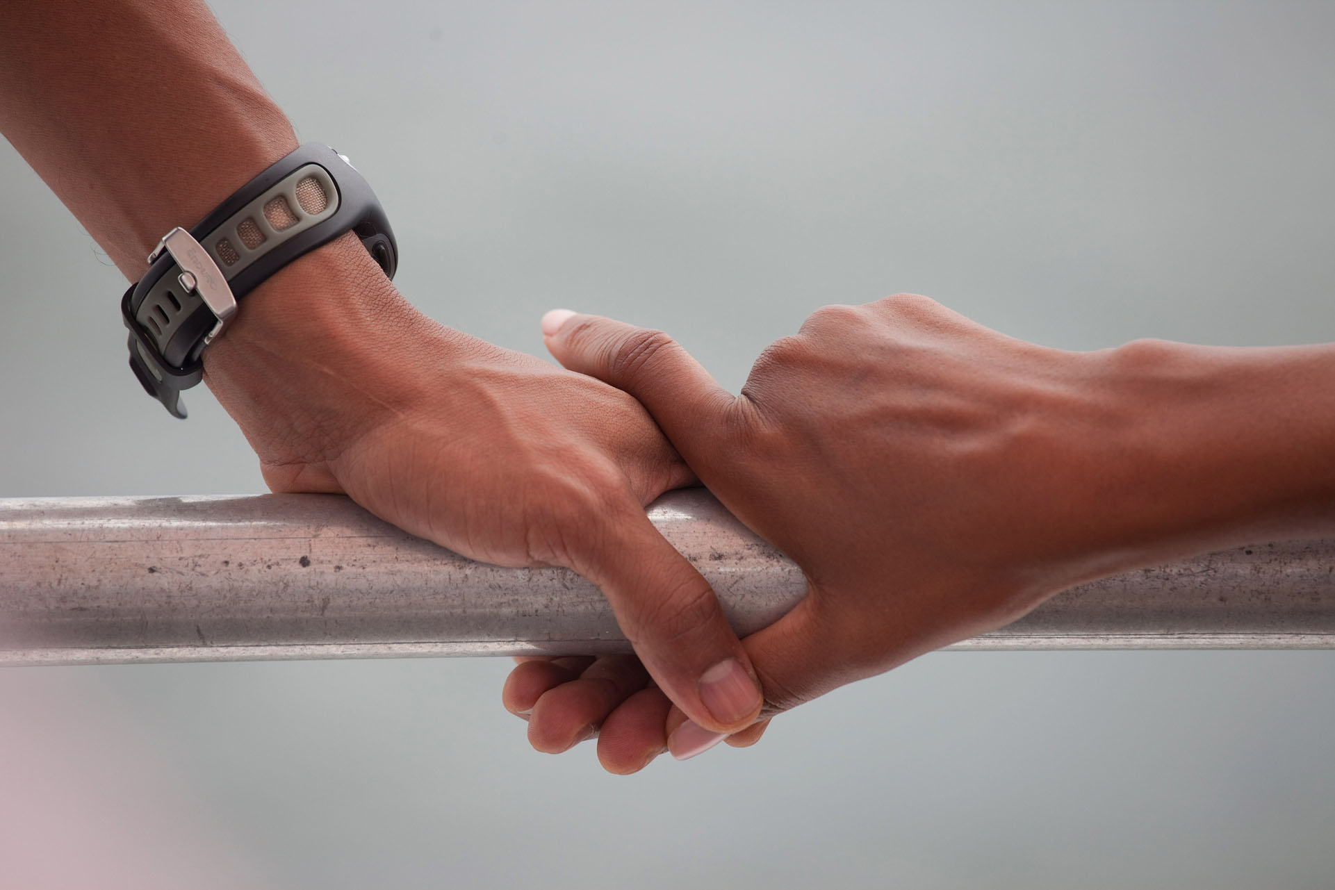 President Barack Obama and First Lady Michelle Obama’s Hands Rest on the Railing of a Boat