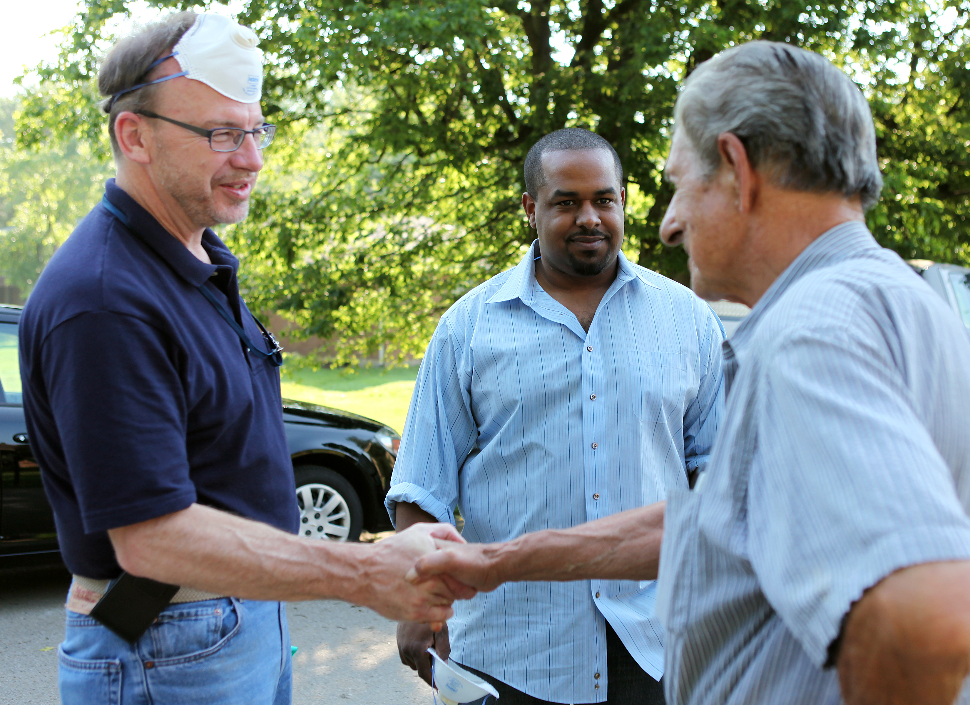 Joshua DuBois and David Myers Meet with Flood Survivor