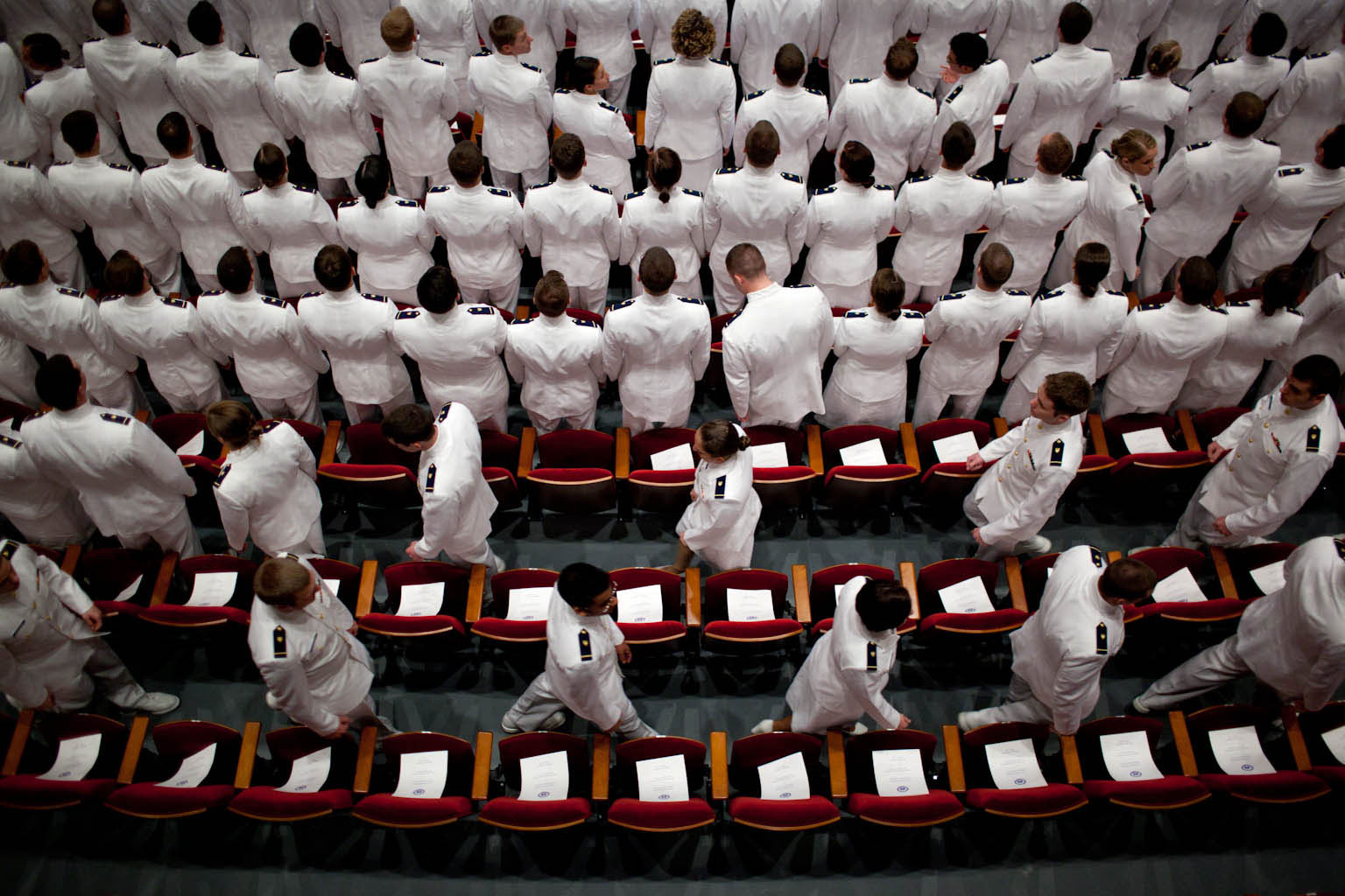 Cadets file into Leamy Hall to take their seats at the U.S. Coast Guard Academy graduation ceremony