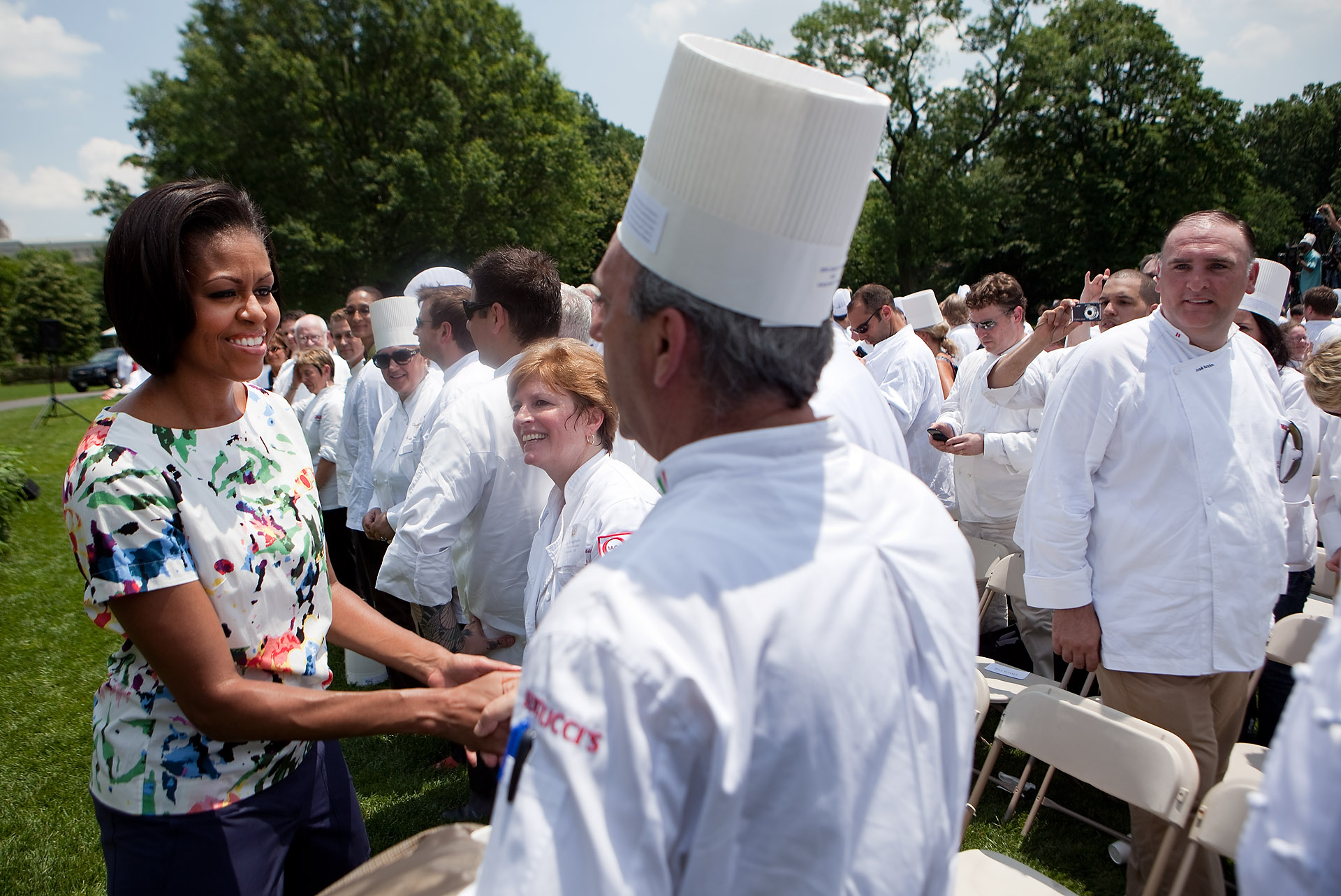 First Lady Michelle Obama greets one of the hundreds of chefs 