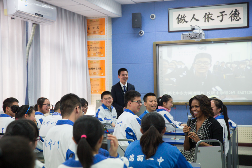 First Lady Michelle Obama talks with students in an interactive classroom at Number 7 School in Chengdu