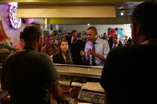 President Barack Obama orders lunch during a local stop at Franklin Barbecue