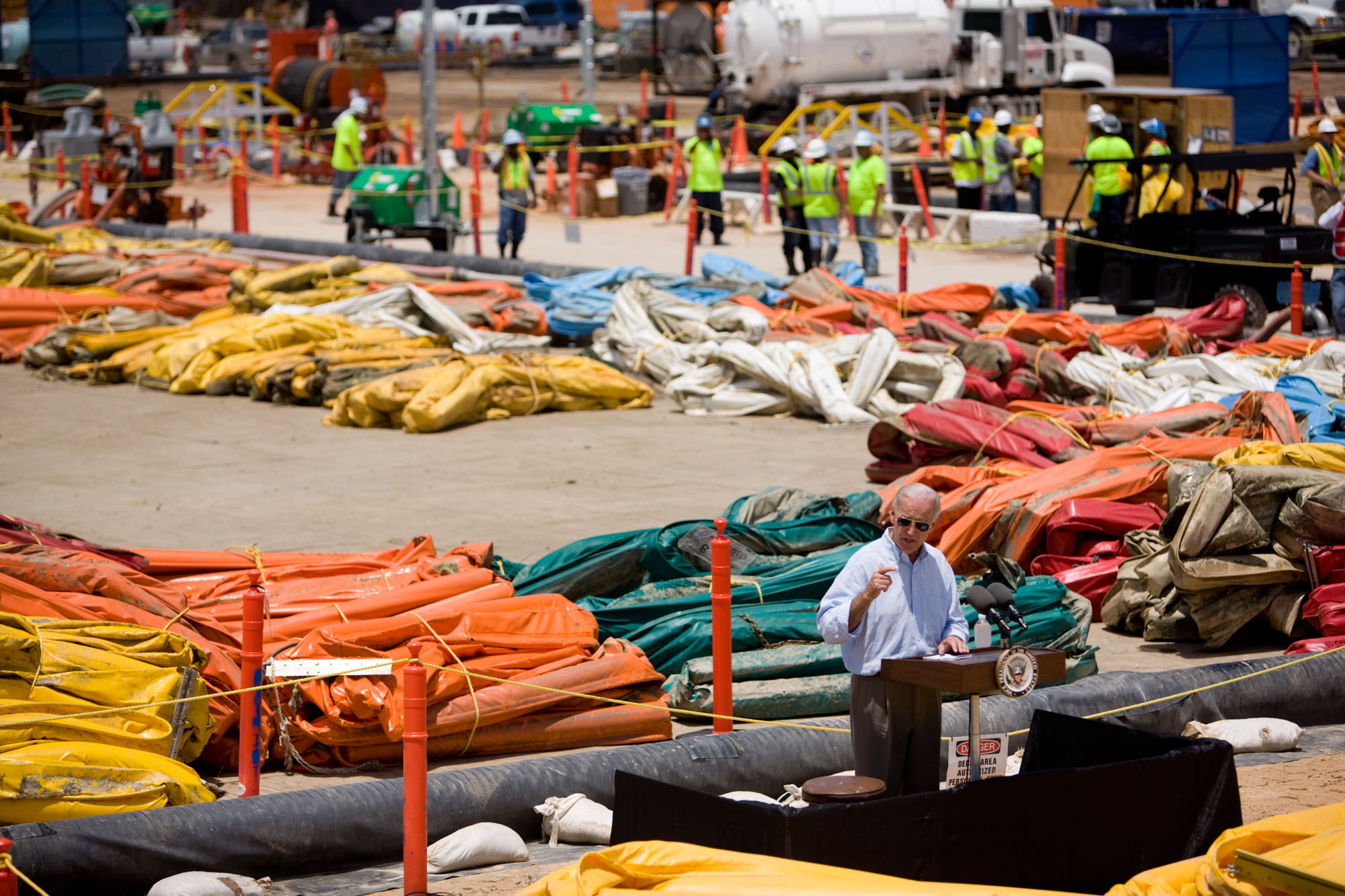 Vice President Joe Biden speaks to workers and the press at the Theodore Staging Area