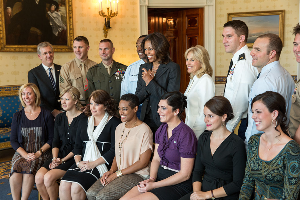 First Lady Michelle Obama and Dr. Jill Biden join USO honorees for a group photo 