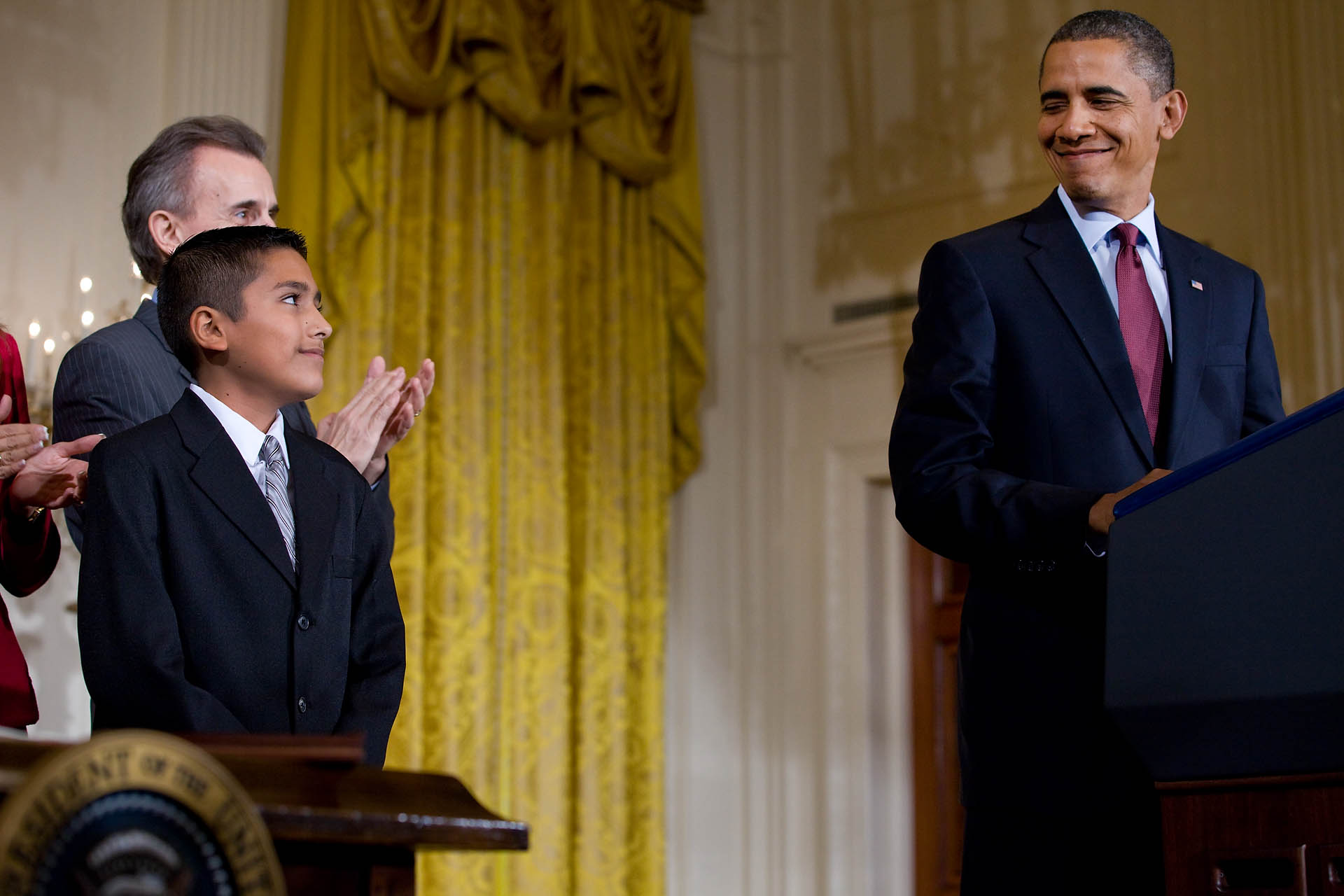 President Barack Obama Looks Over to Javier Garcia of Brownsville, Texas at Signing Ceremony for the Executive Order on Educational Excellence for Hispanic Americans