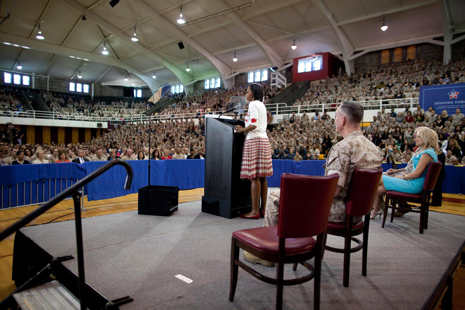 First Lady Michelle Obama delivers remarks to some 3,000 Marines, soldiers, sailors, and military family members at Goettge Memorial Field House at Camp Lejeune, N.C., 