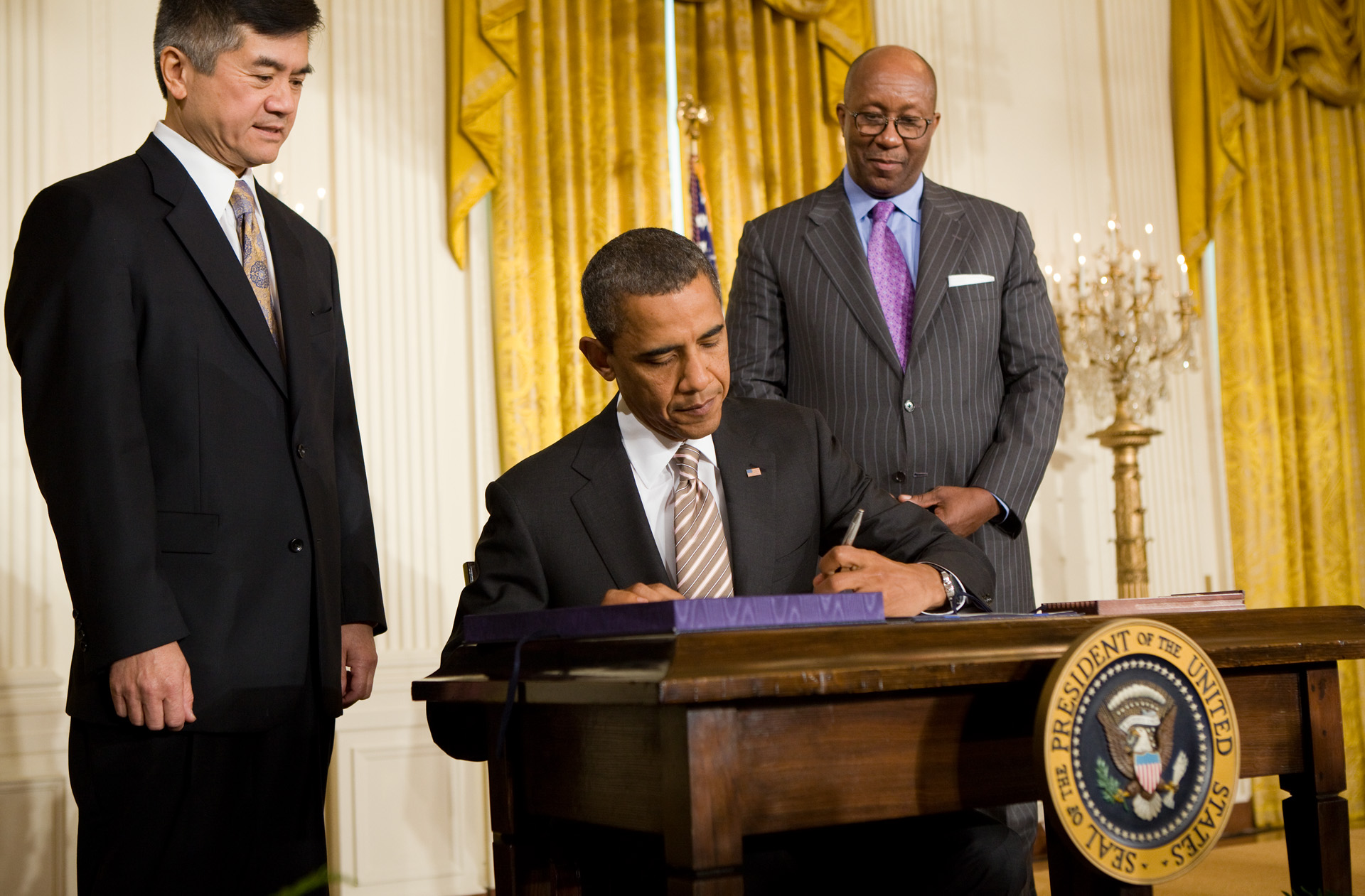 The President Signs the Manufacturing Enhancement Act