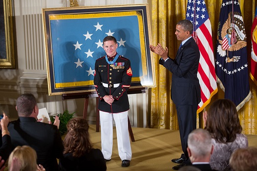 President Barack Obama leads an ovation for Corporal William 