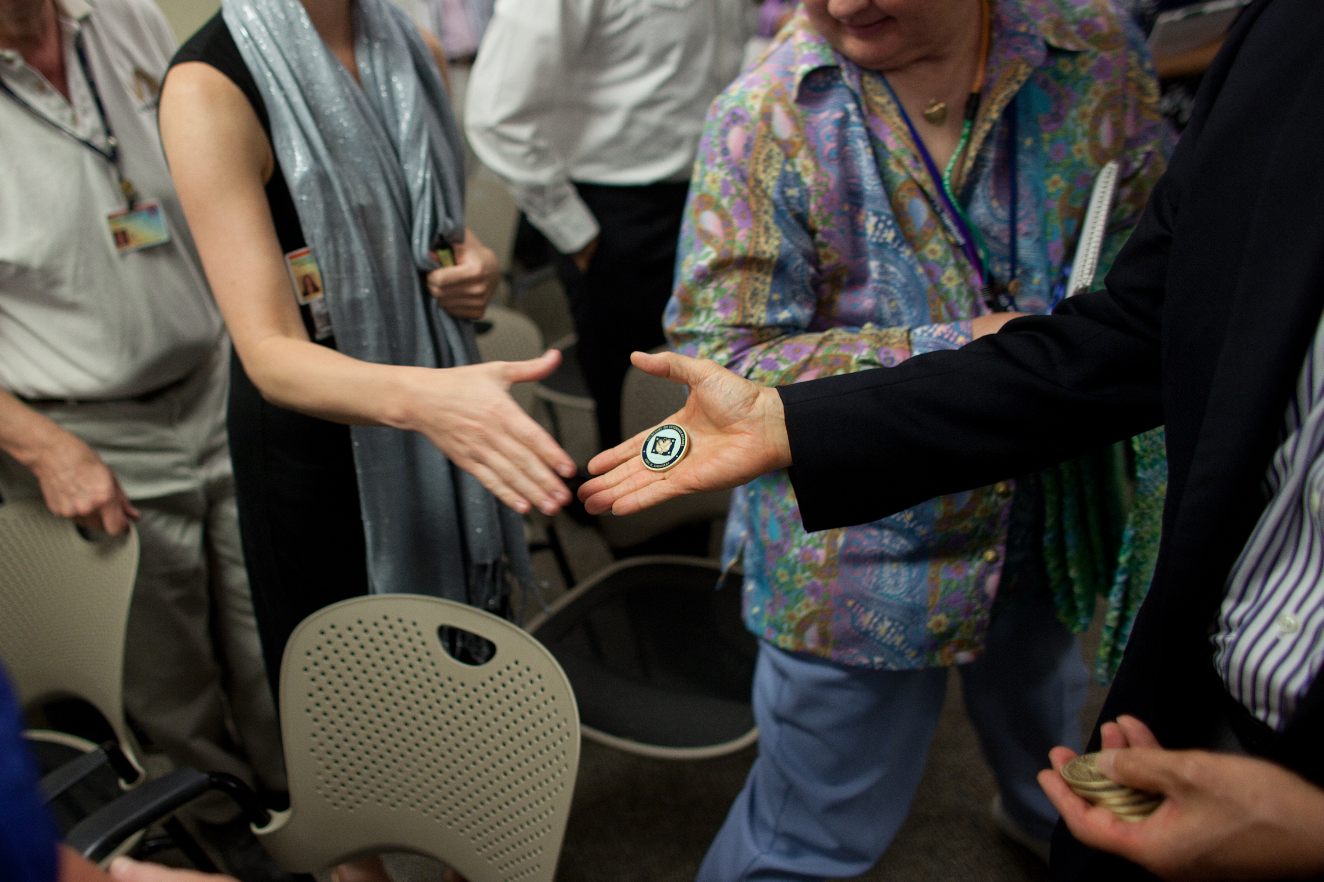 Secretary Shinseki Hands Out a Challenge Coin