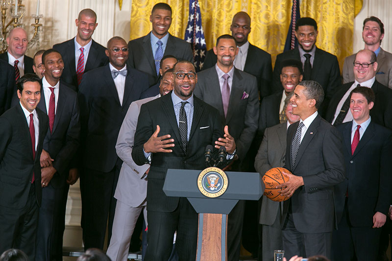 President Obama accepts a basketball from LeBron James of the Miami Heat, Jan. 28, 2013 