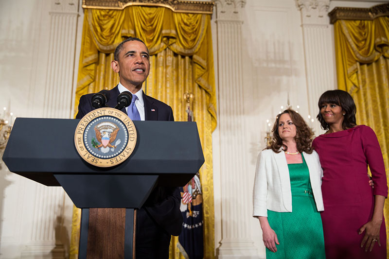 President Barack Obama with First Lady Michelle Obama and Amanda McMillan at the Women’s History Month reception, March 18, 2013.