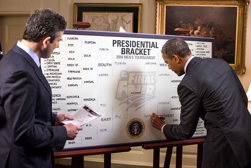 President Barack Obama fills out his 2014 NCAA Division I Men's Basketball Tournament bracket during an ESPN interview with Andy Katz in the Map Room of the White House, March 18, 2014.