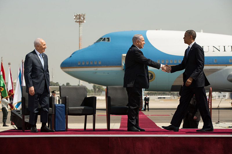 President Obama shakes hands with Israeli Prime Minister Netanyahu during the official arrival ceremony in Tel Aviv, Israel, March 20, 2013