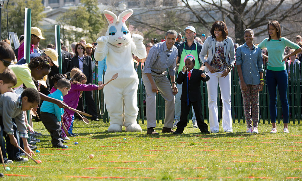 President Obama, Mrs Obama, Sasha and Malia with “Kid President” Robby Novak on the South Lawn for the 2013 White House Easter Egg Roll, April 1, 2013. 