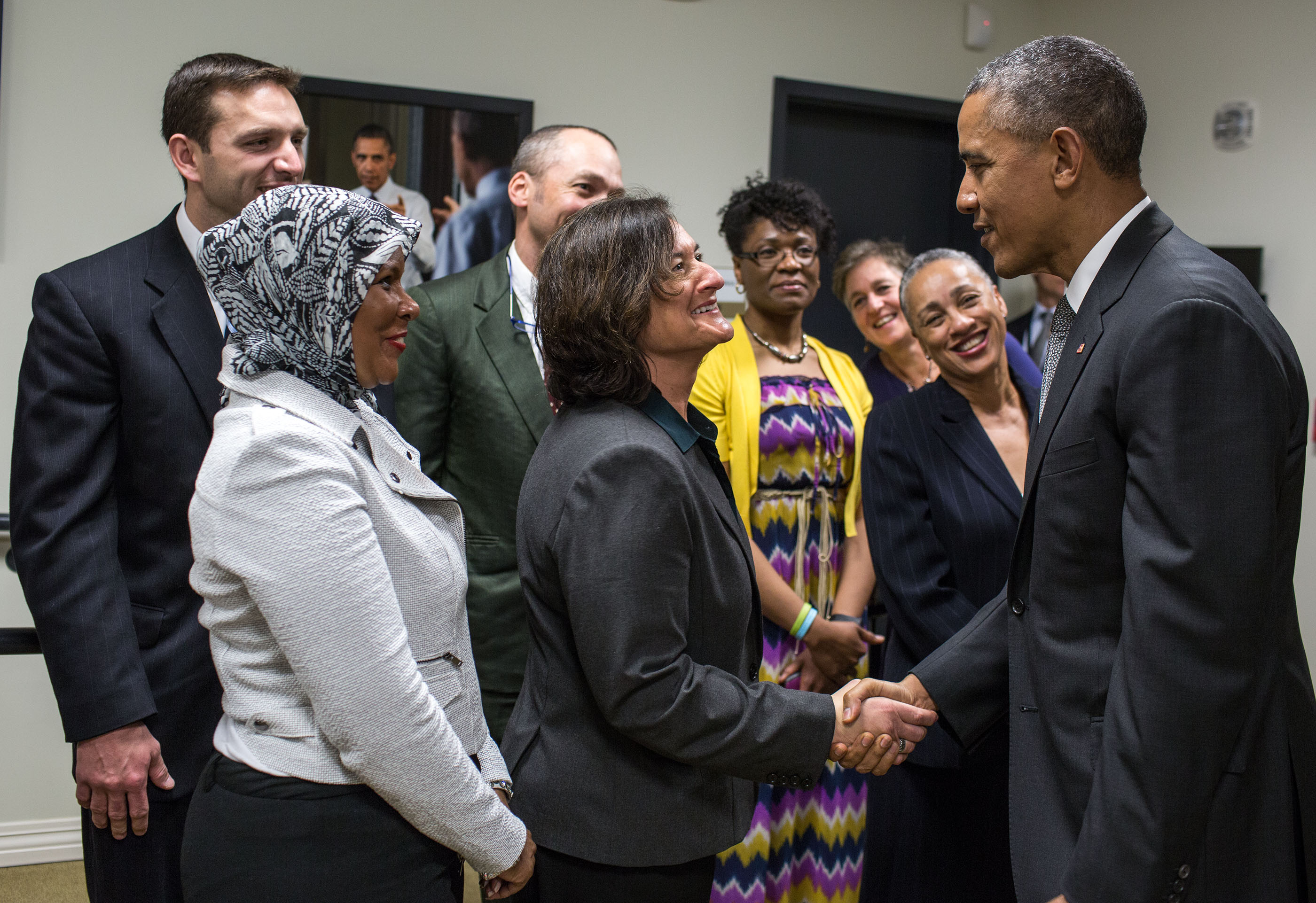 President Obama greets stage participants prior to a Champions of Change event