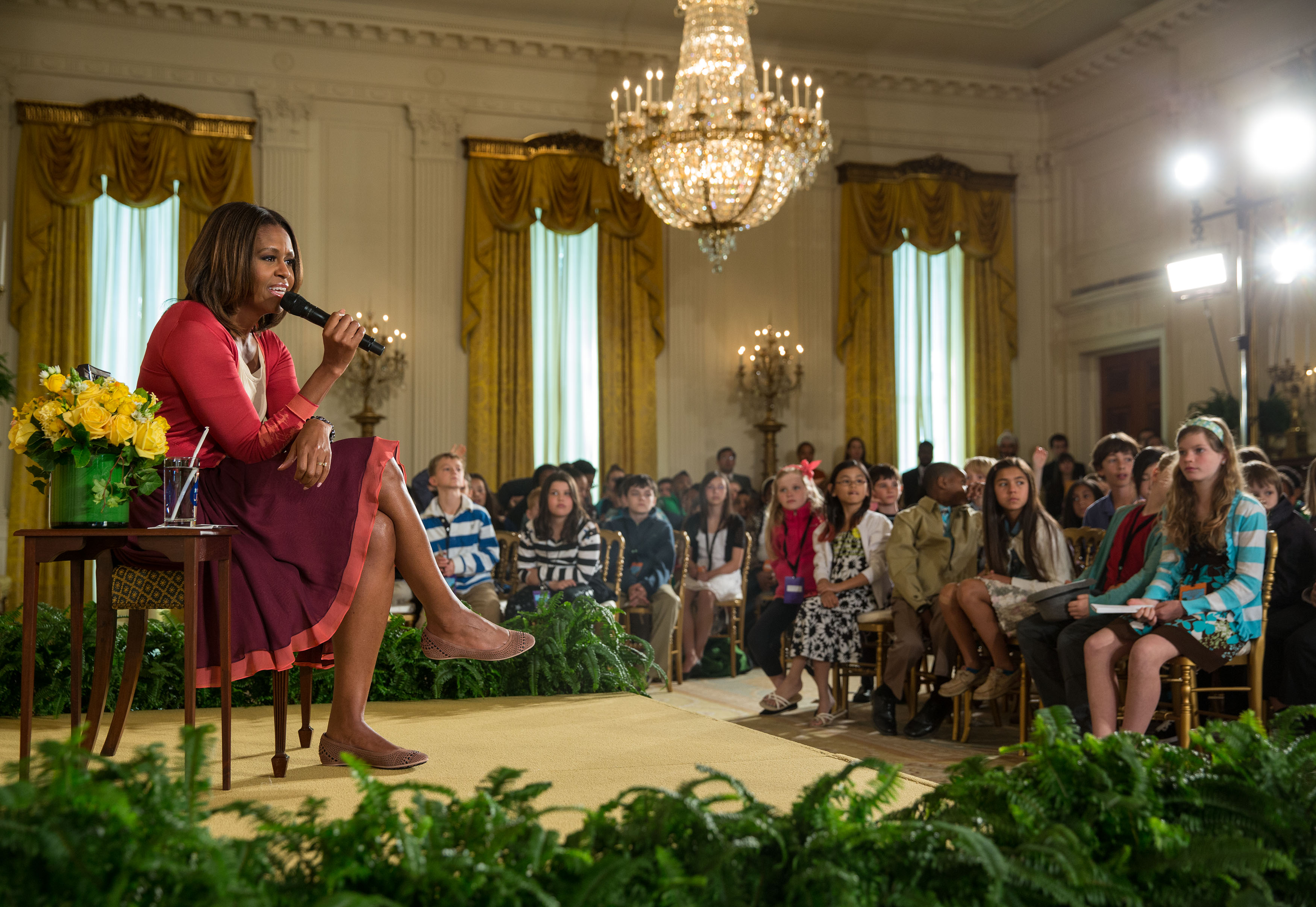 First Lady Michelle Obama answers questions from children at the White House's annual Take Our Daughters and Sons to Work Day