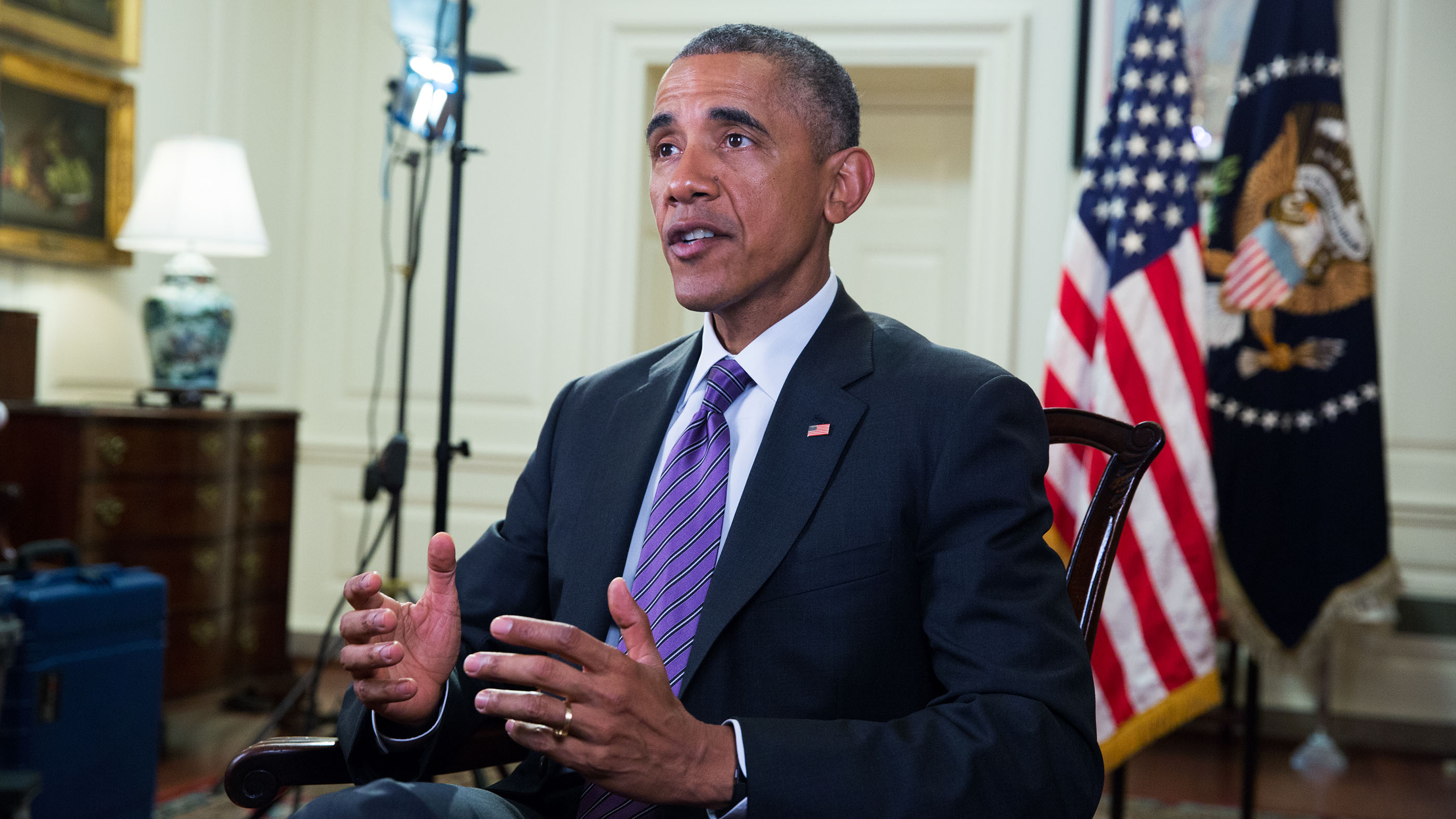 President Barack Obama tapes the Weekly Address in the Map Room of the White House, April 24, 2015.