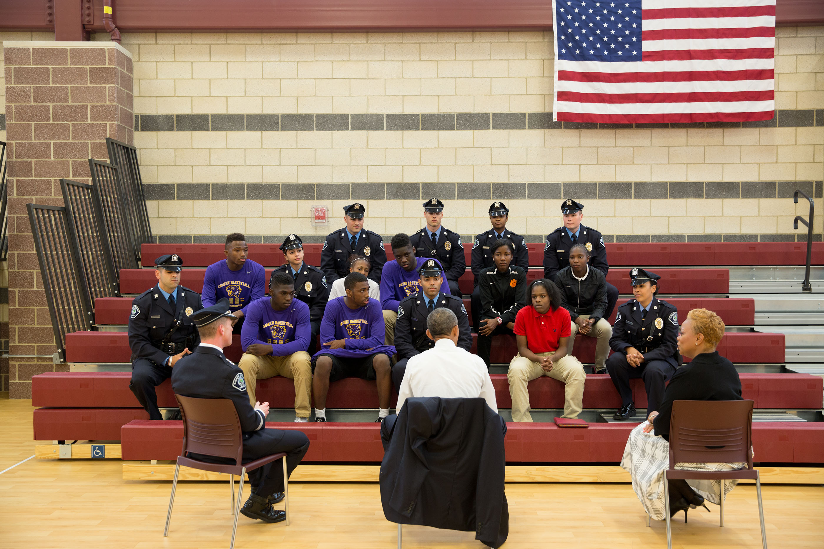 President Obama talks with students and law enforcement officials