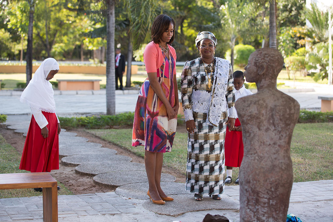 First Lady Michelle Obama and Salma Kikwete pause for a moment of silence