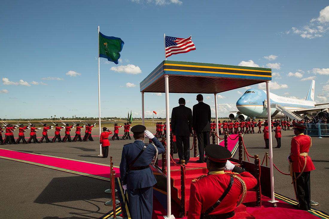 President Barack Obama and President Jakaya Kikwete of Tanzania watch as an honor guard passes during the arrival ceremony