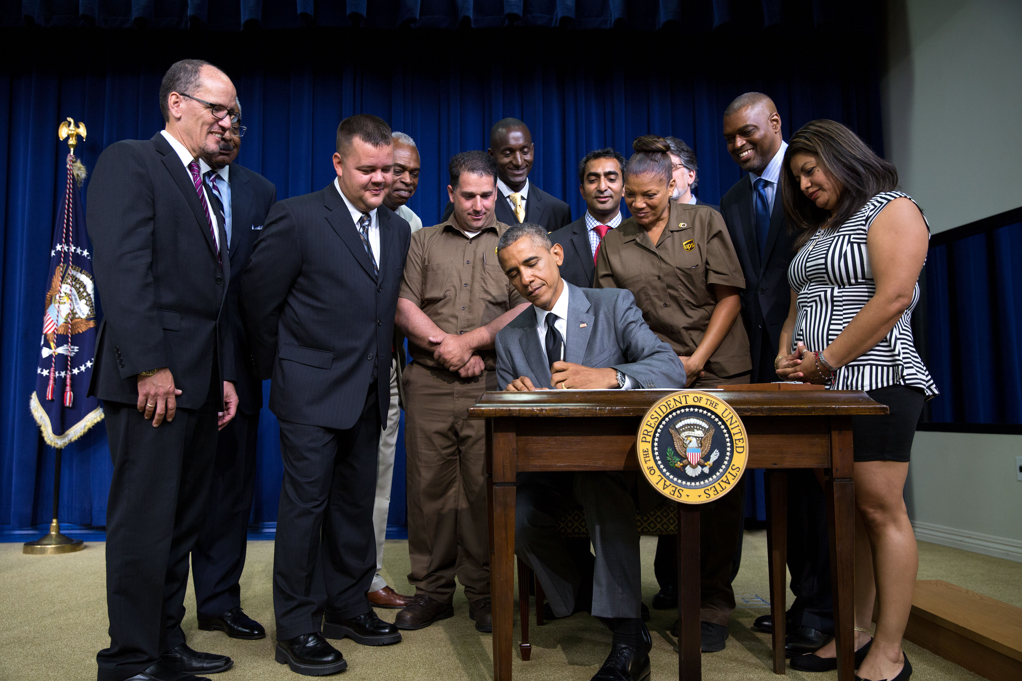 President Barack Obama signs the 