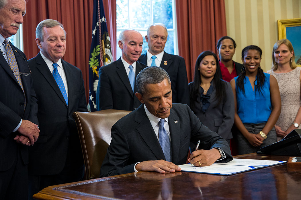 President Barack Obama signs H.R. 1911, the 