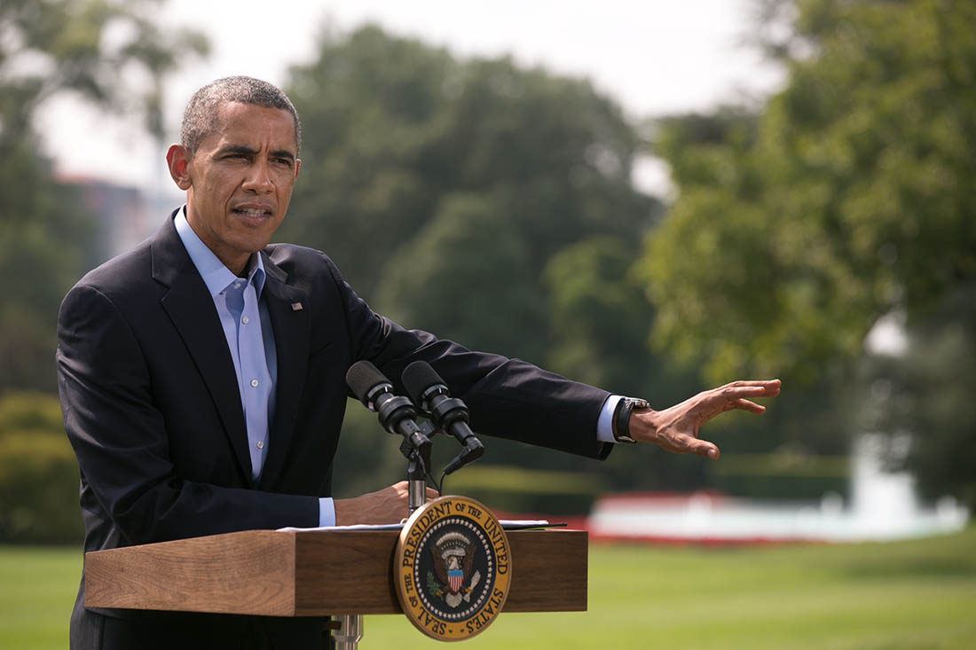 President Obama delivers a statement to the press on the South Lawn before he departs for Martha's Vineyard