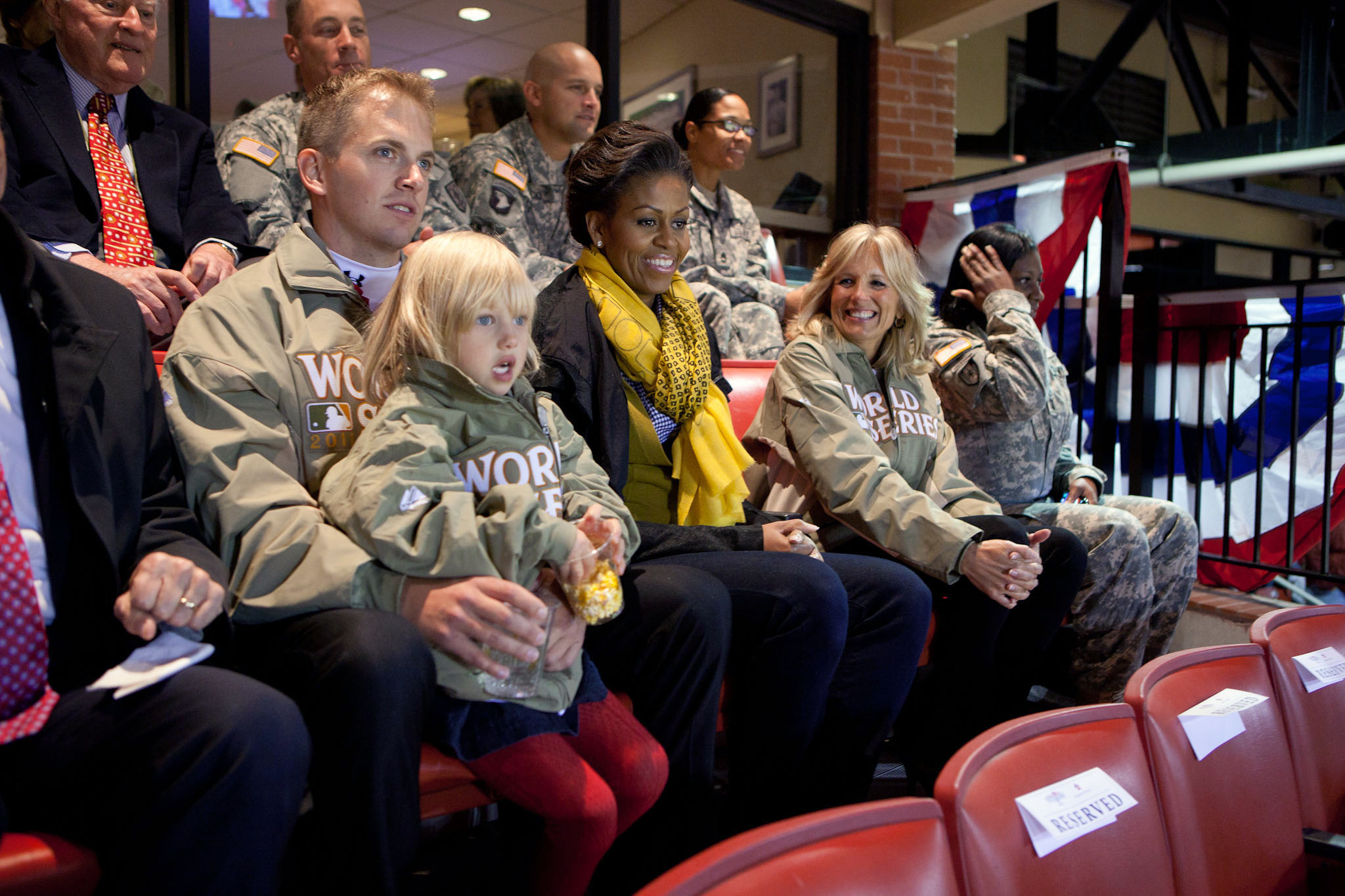 First Lady Michelle Obama and Dr. Jill Biden watch Game one of the 2011 World Series