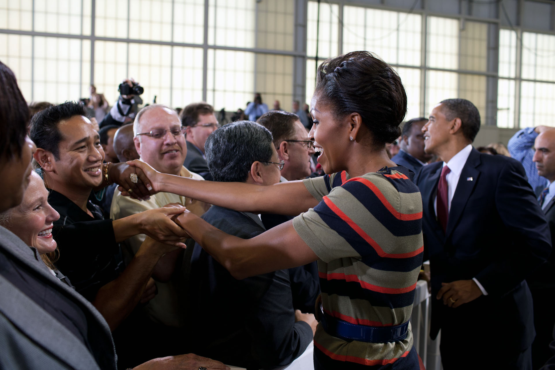 President Obama and First Lady Michelle Obama greet people at Joint Base Langley-Eustis 