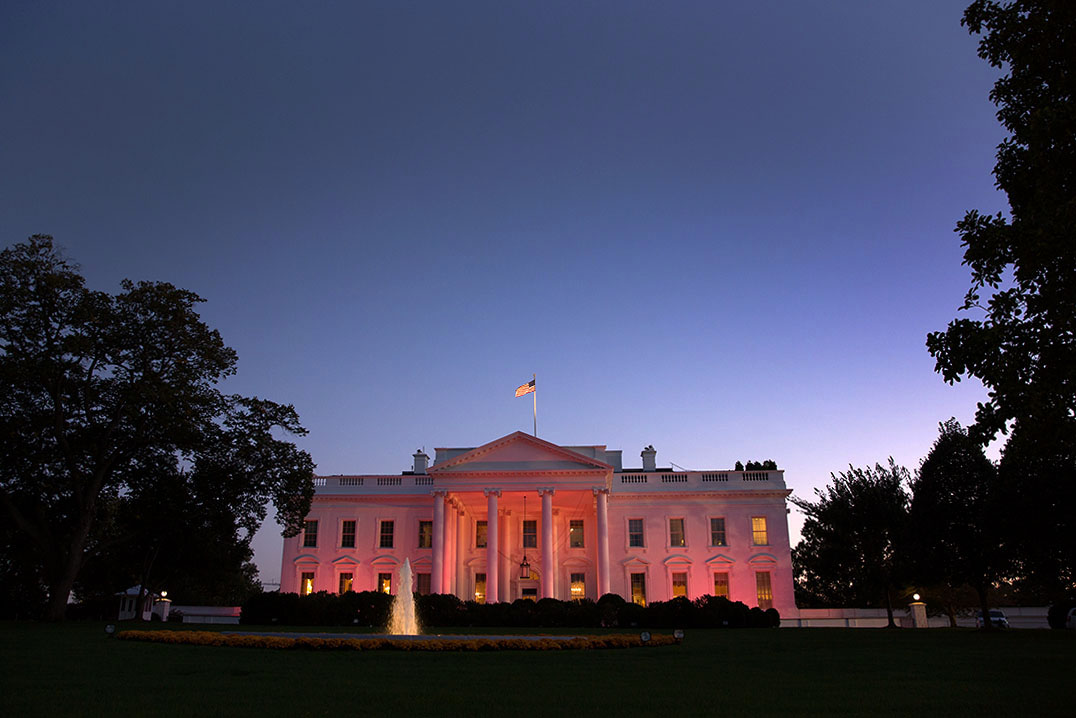 The White House is illuminated pink in honor of Breast Cancer Awareness Month