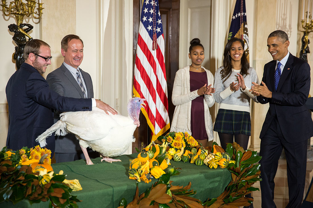 President Barack Obama, National Turkey Federation Chairman Gary Cooper; and son Cole Cooper participate in the annual National Thanksgiving Turkey pardon ceremony in the Grand Foyer of the White House, Nov. 26, 2014.