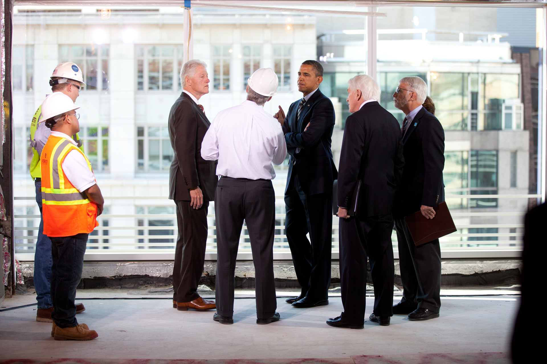President Obama and President Clinton tour Transwestern Building