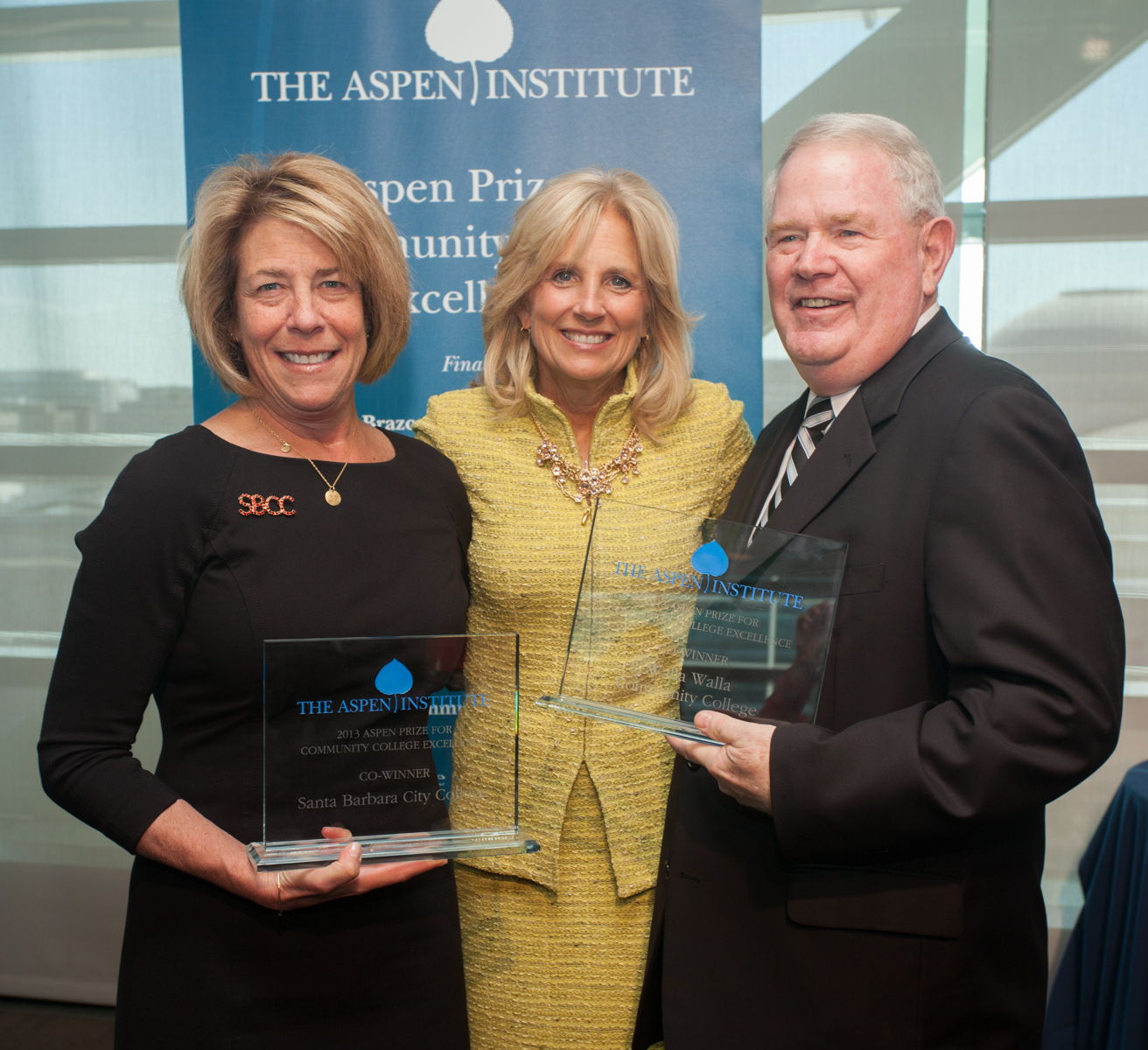 Dr. Jill Biden with the co-winners of the 2013 Aspen Community College Excellence Prize