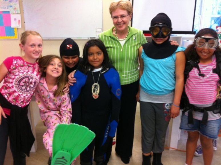 Girls in Santa Barbara, CA take a break from learning about oceanography during a visit with Dr. Jane Lubchenco