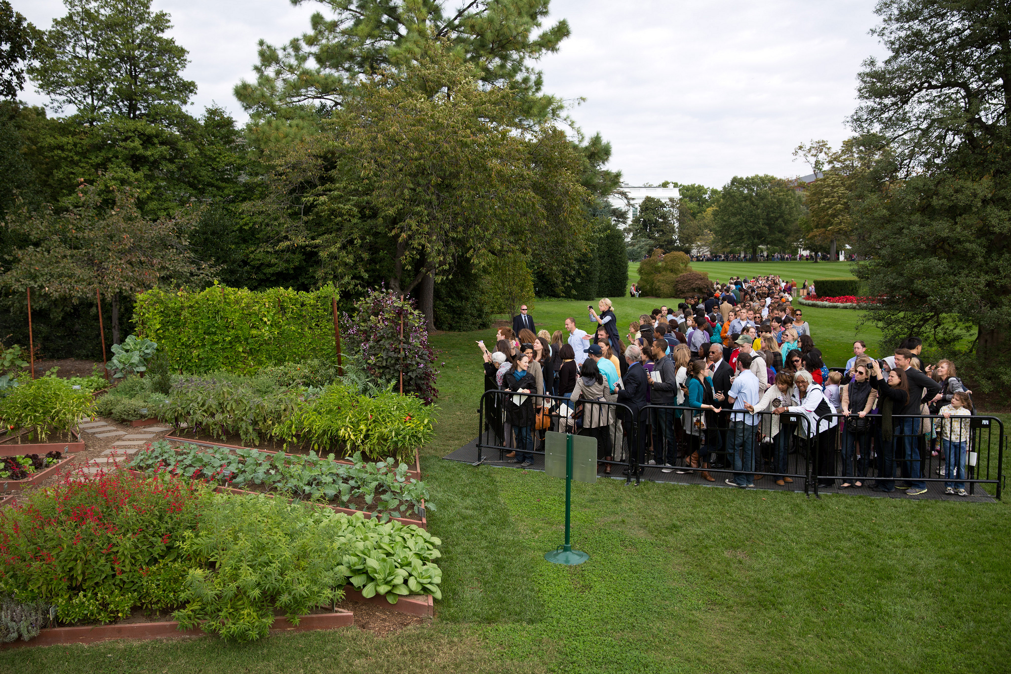 Members of the public view the Kitchen Garden during the White House Fall Garden Tour on the South Ground