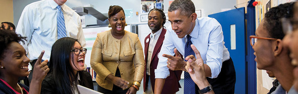 President Barack Obama and Education Secretary Arne Duncan talk with students while visiting a classroom at the Pathways in Technology Early College High School (P-TECH) in Brooklyn, NY, Oct. 25, 2013. (Official White House Photo by Pete Souza)