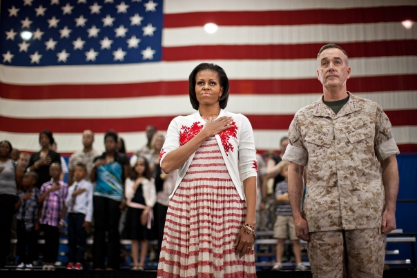 First Lady Michelle Obama stands for the Pledge at a Joining Forces event