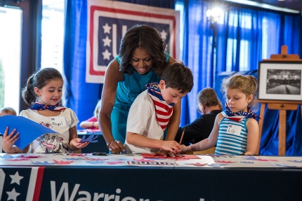 First Lady Michelle Obama participates in a service project.
