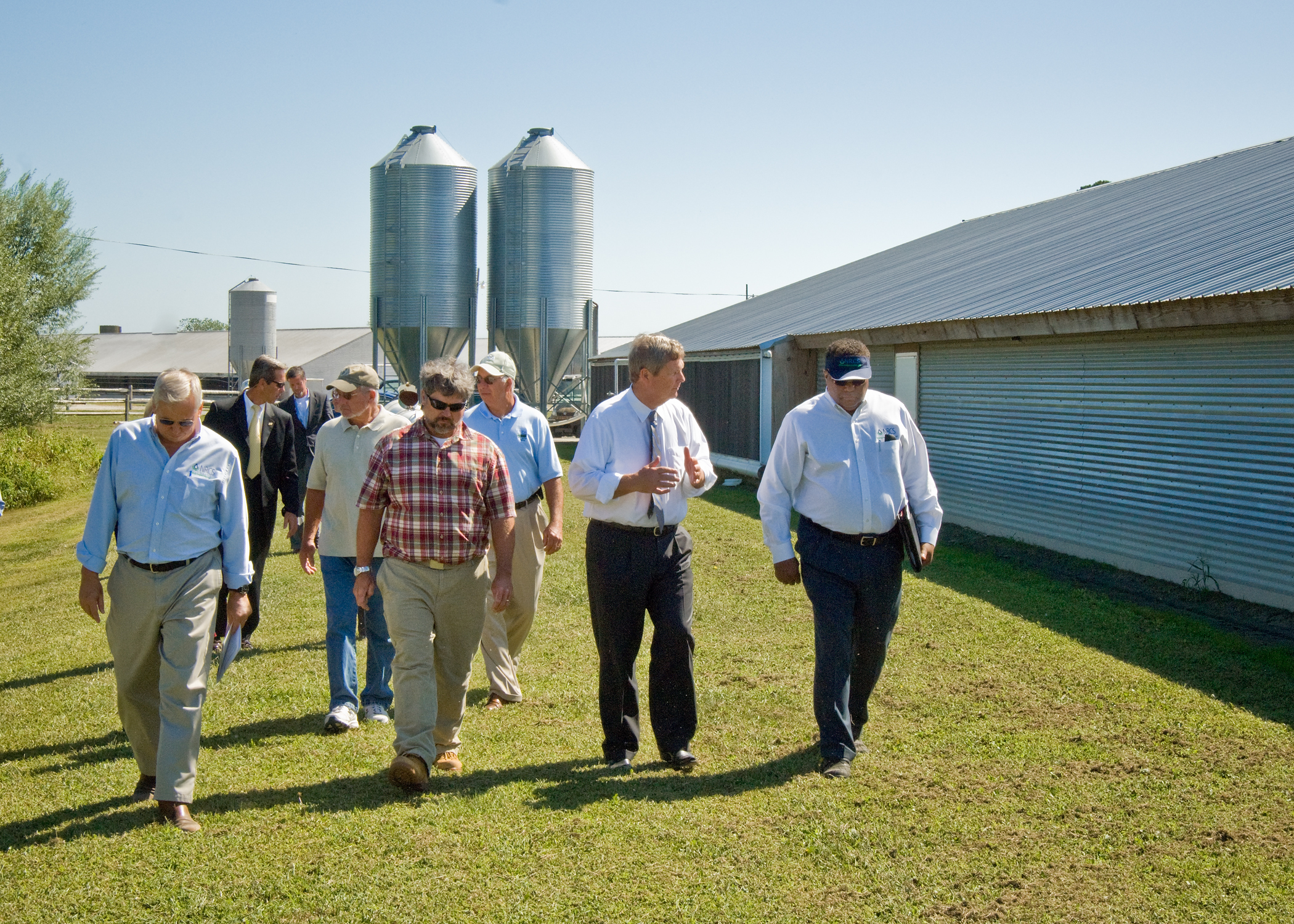 A group takes a walking tour of Double B Farms on Monday, September 20, 2010.