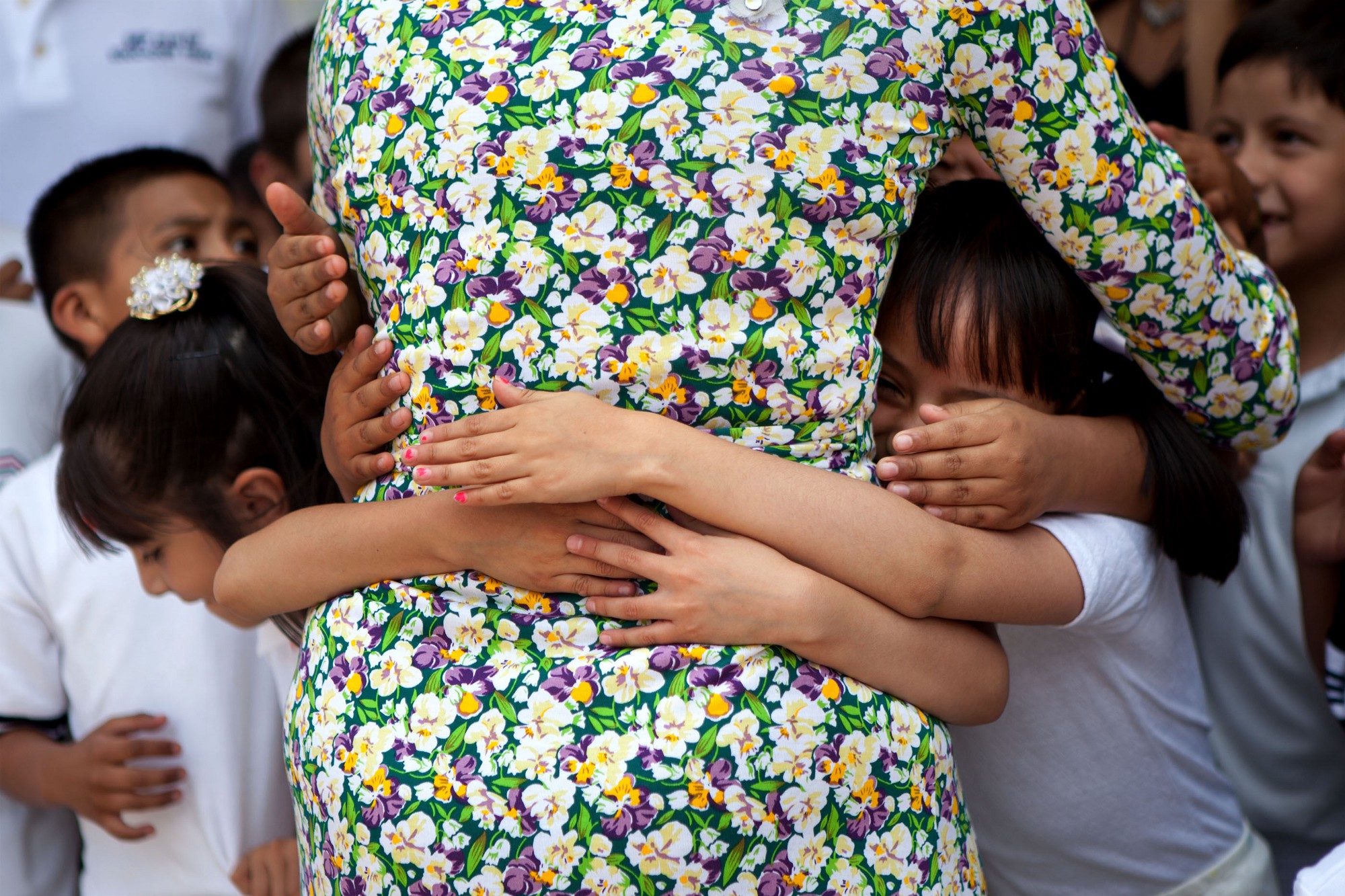 April 14, 2010. Surrounded by school children at the Escuela Siete de Enero in Mexico City, Mexico. (Official White House Photo by Samantha Appleton)