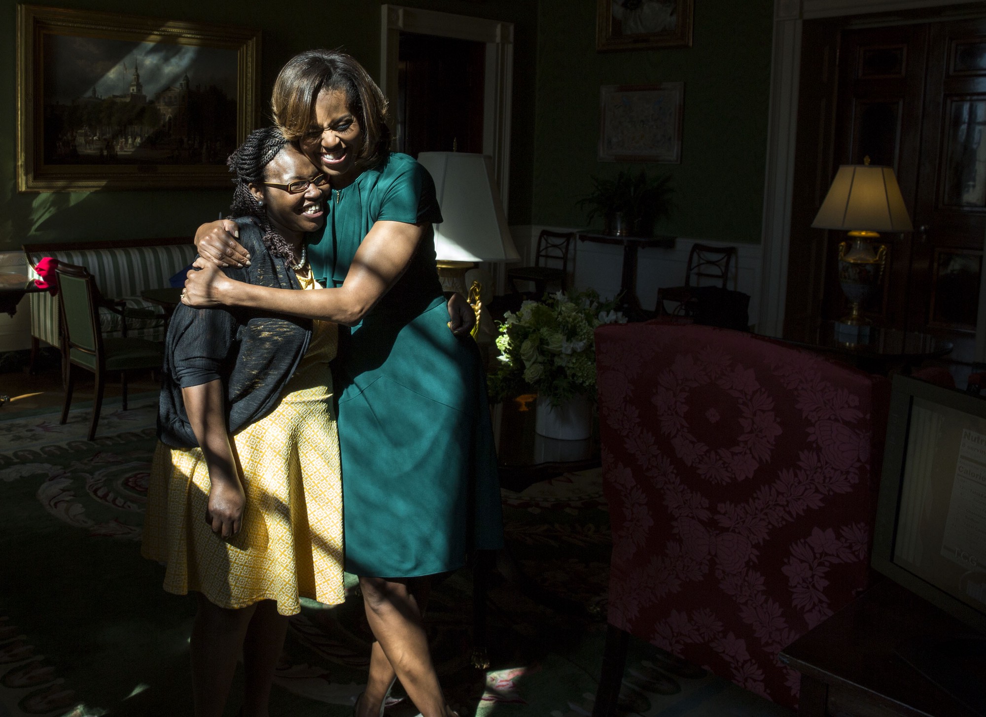 Feb. 27, 2014. Greeting introducer Shanese Bryant prior to the “Let’s Move!” Nutrition Facts label event at the White House. (Official White House Photo by Chuck Kennedy)