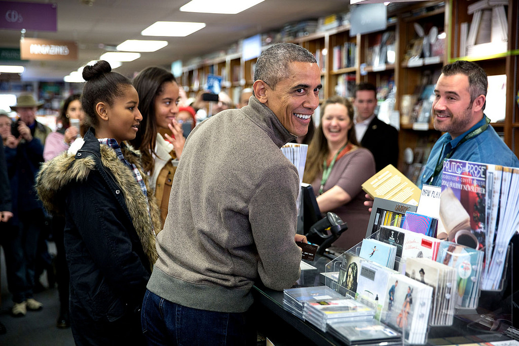 President Barack Obama and daughters Sasha and Malia shop for books at Politics and Prose in Washington, D.C., on Small Business Saturday, Nov. 29, 2014. (Official White House Photo by Pete Souza)
