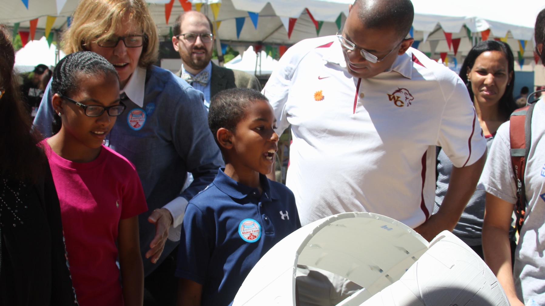 U.S. Chief Technology Officer Megan Smith and Secretary of Transportation Anthony Foxx examined a DIY-replica of the popular BB-8 robot during the National Maker Faire at University of the District of Columbia, June 18, 2016. (Photo Credit: Tyler Daniels)